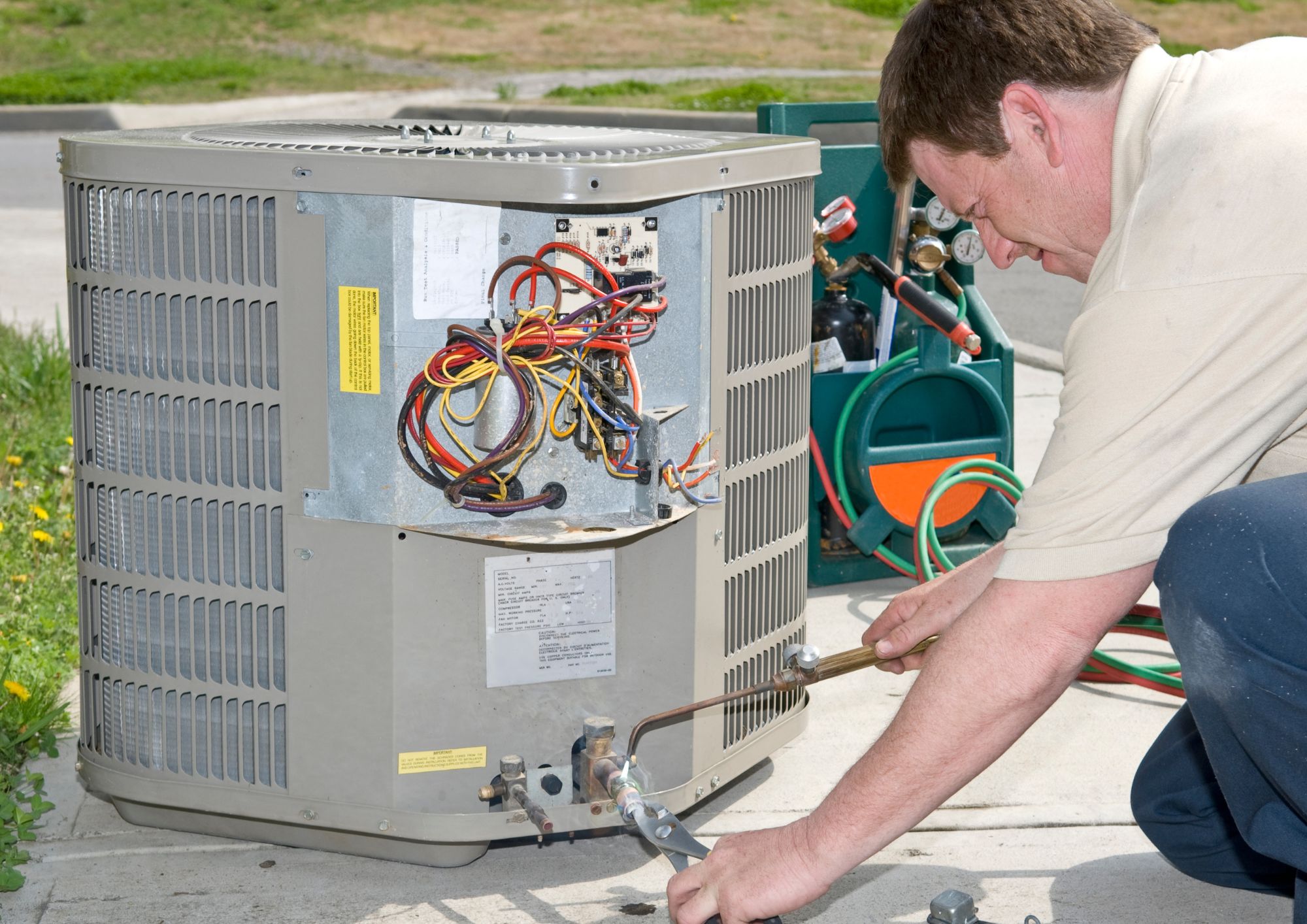 10 Tips for Keeping Your AC Running Smoothly this Summer - #2 Keep the Outdoor Unit Clean